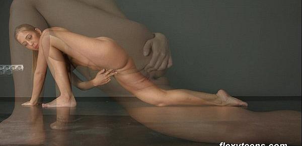 Brunette gymnast Zina shows how flexible she is